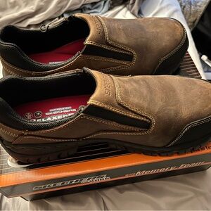 Skechers slip on steel toe work shoes.Size 13
